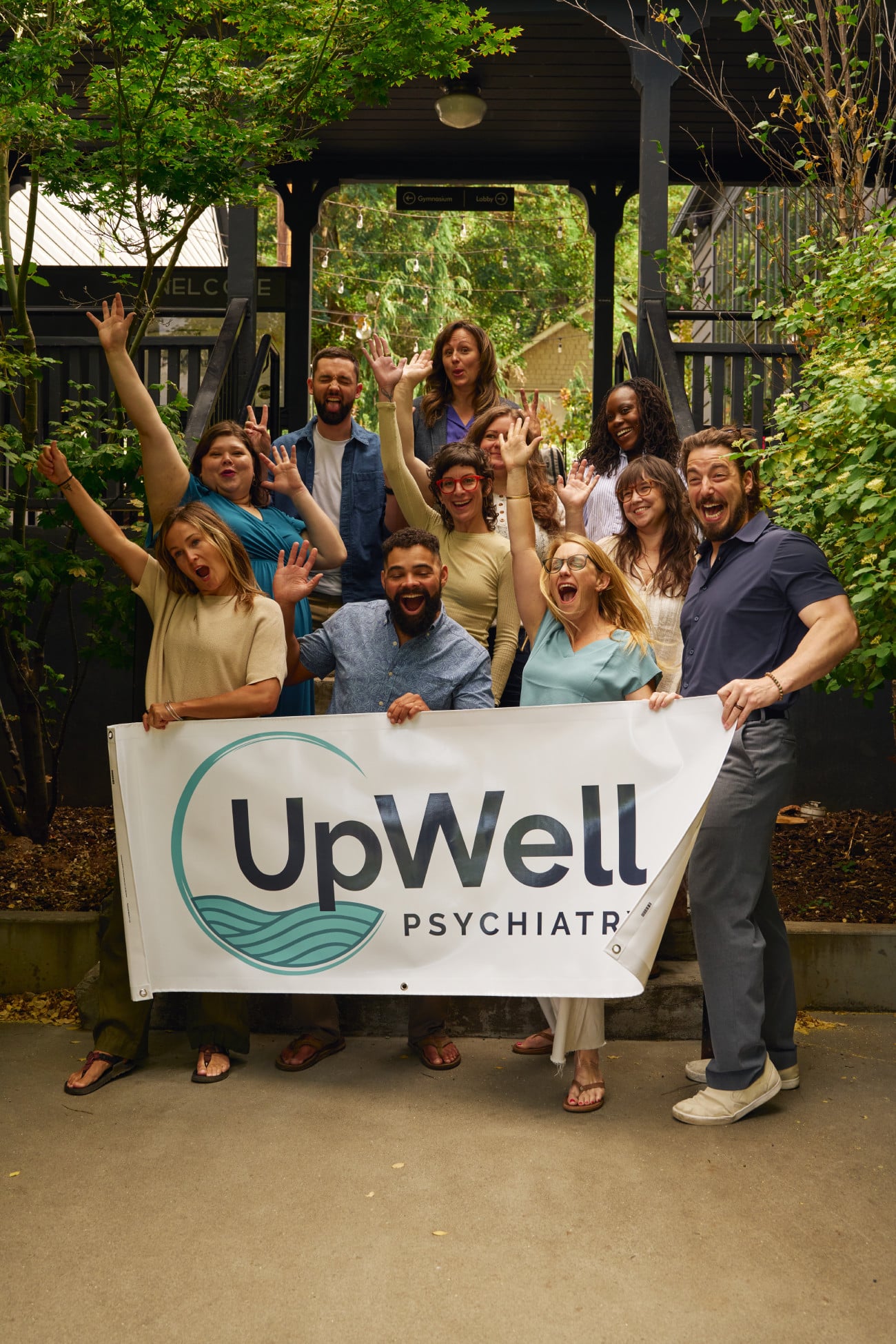 UpWell Psychiatry team members smiling outdoors